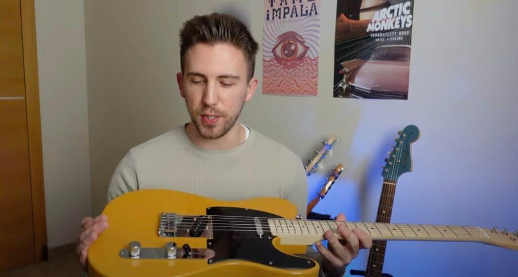 man with squier sonic telecaster